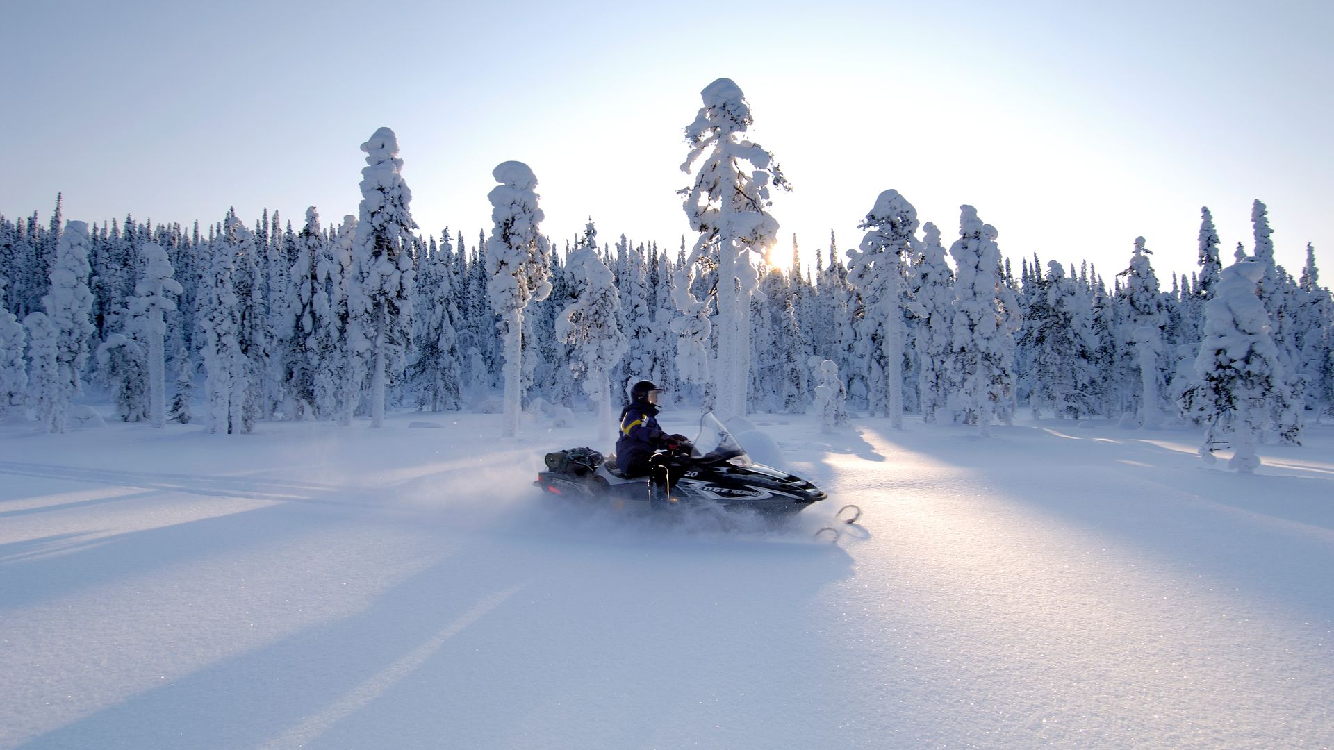 Snowmobile in Finnish Lapland ©VisitFinland